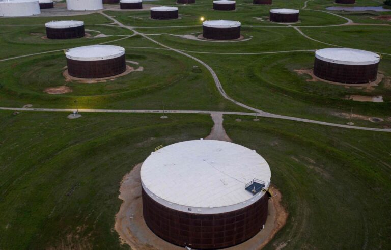 Oil prices pressured by data showing large rise in crude inventories